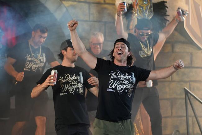 Vegas Golden Knights right wing Jo<em></em>nathan Marchessault celebrates during a rally after a parade along the Las Vegas Strip for the NHL hockey champions Saturday, June 17, 2023, in Las Vegas. (AP Photo/John Locher)