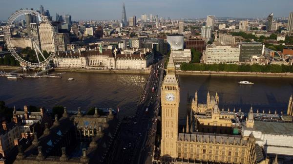 Big Ben, The Lo<em></em>ndon Eye and The Shard are seen on a summer evening