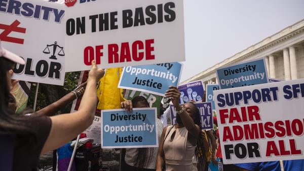 Demo<em></em>nstrators protest for and against the Supreme Court decision to strike down race-co<em></em>nscious student admissions programs at Harvard University and the University of North Carolina at the Supreme Court in Washington, D.C.