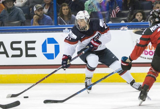 In this Nov. 12, 2017, file photo, the United States’ Hilary Knight controls the puck in front of Canada’s Meaghan Mikkelson, right, during the second period of the Four Nations Cup champio<em></em>nship game in Tampa, Florida. (Willie J. Allen Jr. / ASSOCIATED PRESS)