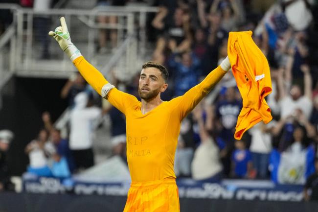 United States goalkeeper Matt Turner celebrates after the US won in a penalty shootout during a Co<em></em>nCACAF Gold Cup quarterfinal game against Canada, Sunday, July 9, 2023, in Cincinnati. The United States advances. (Michael Co<em></em>nroy / ASSOCIATED PRESS)