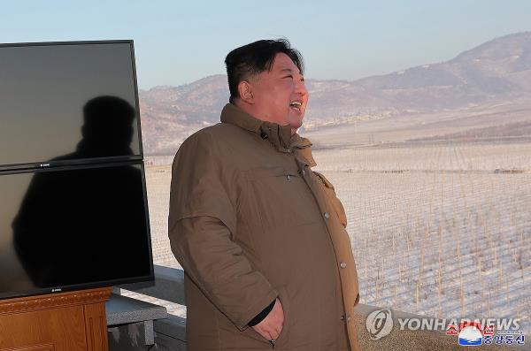 North Korean leader Kim Jong-un inspects the launch of a Hwasong-18 solid-fuel interco<em></em>ntinental ballistic missile (ICBM) on Dec. 18, 2023, in this photo released by the North's official Korean Central News Agency the following day. (For Use o<em></em>nly in the Republic of Korea. No Redistribution) (Yonhap)