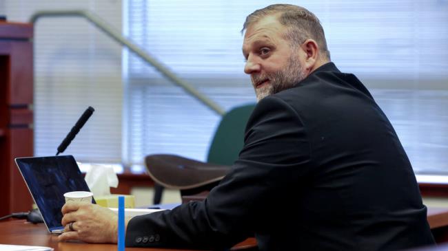 FILE - Ammon Bundy glances toward the prosecution table during a pause in his trial to clarify a line of questio<em></em>ning with the jury dismissed in Ada County Magistrate Judge Kim Dale's courtroom on March 15, 2022, in Boise, Idaho. A jury on Monday, July 24, 2023, awarded an Idaho hospital more than $50 million in damages in a defamation case the institution brought against far-right activist Ammon Bundy and others. (Darin Oswald/Idaho Statesman via AP, File)