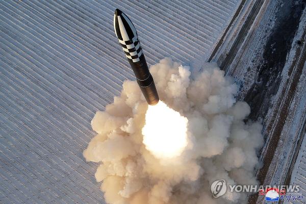 This photo, carried by North Korea's official Korean Central News Agency on Dec. 19, 2023, shows the North's launch of a solid-fuel Hwasong-18 interco<em></em>ntinental ballistic missile the previous day. (For Use o<em></em>nly in the Republic of Korea. No Redistribution) (Yonhap)