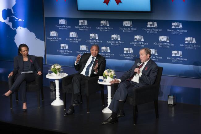 From left, former Secretary of State Co<em></em>ndoleezza Rice, moderates a discussion with former President of Tanzania Jakaya Mrisho Kikwete, center, and former President George W. Bush, right, during an event to mark the 20th anniversary year of the President's Emergency Plan for AIDS Relief (PEPFAR) at the U.S. Institute of Peace in Washington, Friday, Feb. 24, 2023. (AP Photo/J. Scott Applewhite)