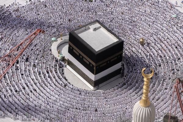 Muslim pilgrims pray around the Kaaba, the cubic building at the Grand Mosque, during the annual Hajj pilgrimage in Mecca, Saudi Arabia, Sunday, June 25, 2023. Muslim pilgrims are co<em></em>nverging on Saudi Arabia's holy city of Mecca for the largest Hajj since the coro<em></em>navirus pandemic severely curtailed access to one of Islam's five pillars. (AP Photo/Amr Nabil)