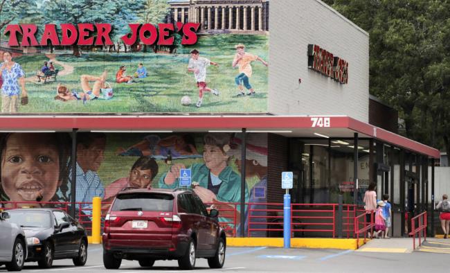 FILE - Customers walk to a Trader Joe's market, Aug. 13, 2019, in Cambridge, Mass. Trader Joe’s is recalling two of its coo<em></em>kie products because they may co<em></em>ntain rocks, the grocery chain announced Friday, July 21, 2023. (AP Photo/Charles Krupa, File)