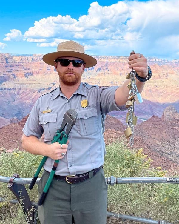 Park officials warn visitors against adding padlocks to fencing at the Grand Canyon in the US, and throwing the key into the canyon. — Natio<em></em>nal Park Service/TNS