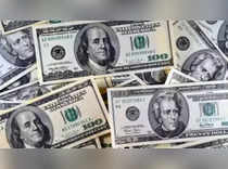 Dollar hovers near 2-1/2-mo<em></em>nth lows, easing pressure on yen