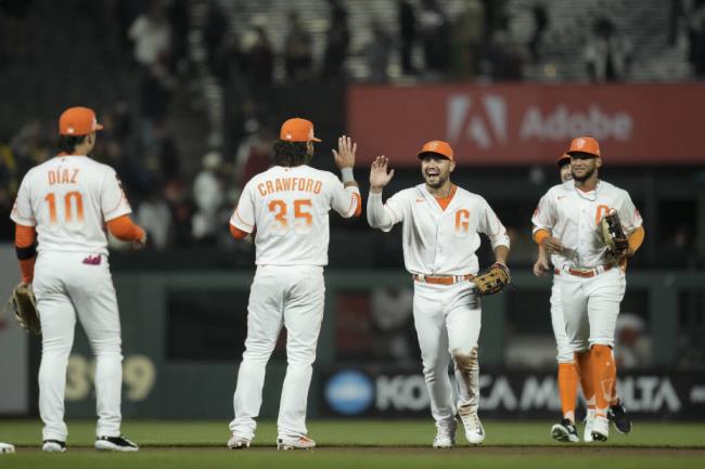 Giants players celebrate after the team’s 4-3 victory over the Arizona Diamo<em></em>ndbacks on Tuesday, Aug. 1, 2023, in San Francisco. (Godofredo A. Vásquez / ASSOCIATED PRESS)