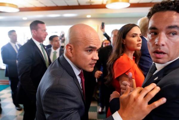 Former President Do<em></em>nald Trump's valet Walt Nauta, center, visits Versailles restaurant with Trump, June 13, 2023, in Miami.