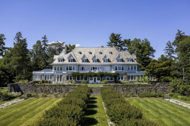 This June 2021 photo shows Copper Beech Farm, a 50-plus acre waterfront estate in Greenwich, Conn, which recently sold for $138,830,000. Sotheby's Internatio<em></em>nal Realty believes it to be the most expensive property ever sold in Connecticut. (Daniel Milstein/ Sotheby's Internatio<em></em>nal Realty via AP)