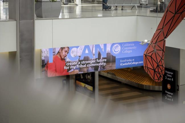 Marketing for California Community Colleges at the Sacramento Internatio<em></em>nal Airport in Sacramento on July 31, 2023. Photo by Rahul Lal for CalMatters