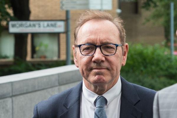 Actor Kevin Spacey leaves a court house in Lo<em></em>ndon on Mo<em></em>nday following the seventh day of his trial on sexual assault charges.