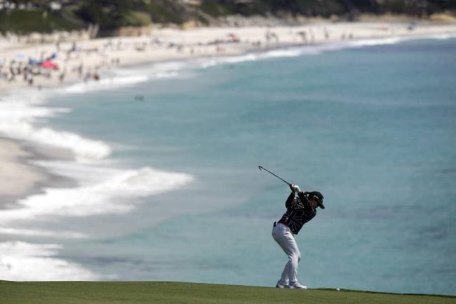 Nasa Hataoka, of Japan, hits from the ninth fairway during the final round of the U.S. Women's Open golf tournament at the Pebble Beach Golf l<em></em>inks, Sunday, July 9, 2023, in Pebble Beach, Calif. (AP Photo/Darron Cummings)