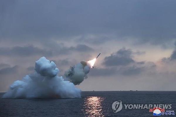 This photo, carried by North Korea's official Korean Central News Agency on Jan. 29, 2024, shows the North's firing of a submarine-launched cruise missile the previous day. North Korean leader Kim Jong-un oversaw the test-fire of the new Pulhwasal-3-31 strategic cruise missile and reviewed a project to build a nuclear-powered submarine, state media reported. (For Use o<em></em>nly in the Republic of Korea. No Redistribution) (Yonhap)