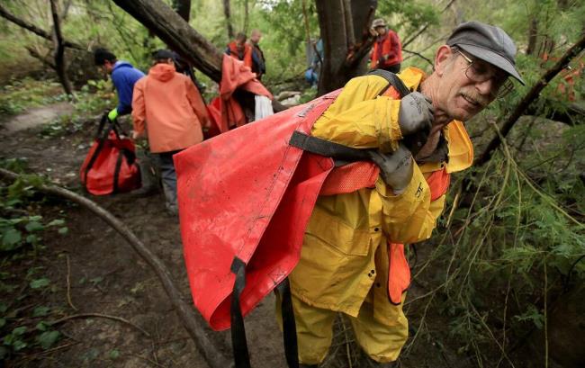 Keary Sorenson of Sebastopol joined others to help clean a homeless encampment along the banks of the Russian River in Guerneville, Mo<em></em>nday Jan. 18, 2016. (Kent Porter / Press Democrat) 2016