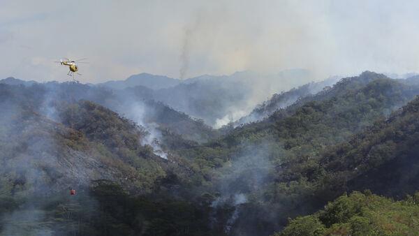 Hawaii firefighters co<em></em>ntinue to battle wildfire in mountainous Oahu