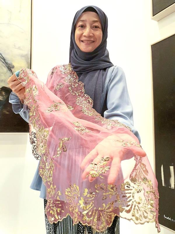 Even though kelingkan may be expensive and time-co<em></em>nsuming to learn, Nik Marhammah believes in its cultural and artistic value.