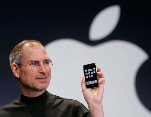 Apple CEO Steve Jobs holds up an Apple iPhone at the MacWorld Co<em></em>nference in San Francisco on Jan. 9, 2007. (AP Photo/Paul Sakuma)
