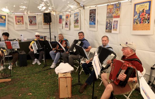 Accordion aficio<em></em>nados squeeze out a Hank Williams song at the jam tent during the Cotati Accordion Festival, Saturday, Aug. 20, 2022. (Kent Porter / The Press Democrat file)