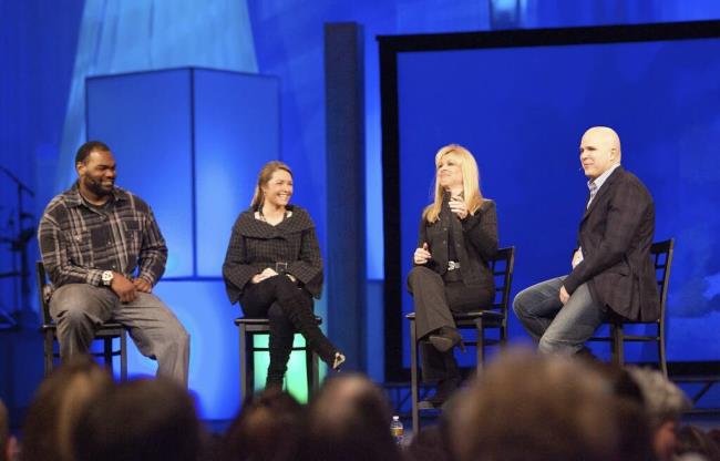 FILE - Michael Oher, left, Collins Tuohy, second from left, and Leigh Anne Tuohy, whose lives are portrayed in the Oscar-nominated movie "The Blind Side," speak with Pastor Kerry Shook, right, March 3, 2010 at Woodlands Church's Fellowship Campus in The Woodlands, TX. Michael Oher, the former NFL tackle known for the movie “The Blind Side,” filed a petition Monday, Aug. 14, 2023, in a Tennessee probate court accusing Sean and Leigh Anne Tuohy of lying to him by having him sign papers making them his co<em></em>nservators rather than his adoptive parents nearly two decades ago. (AP Photo/The Courier, Eric S. Swist, File)