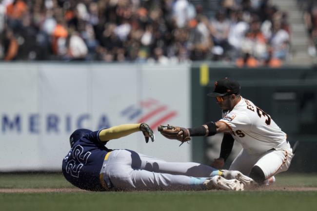 Giants second ba<em></em>seman Thairo Estrada, right, tags out the Tampa Bay Rays’ Jose Siri at second during the fourth inning Wednesday in San Francisco. Siri was attempting to extend his single. (Godofredo A. Vásquez / ASSOCIATED PRESS)