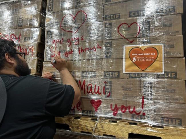 Redwood Empire Food Bank is do<em></em>nating 16 pallets of Clif Bars to Maui residents amid wildfires. Team members signed their well wishes on the outside of the packaged Clif Bars. (Photo courtesy of Redwood Empire Food Bank)