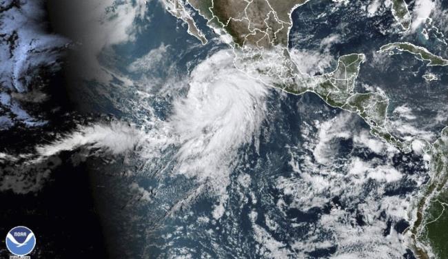 This satellite image taken at 10:50am EDT on Thursday, Aug. 17, 2023, and provided by the Natio<em></em>nal Oceanic and Atmospheric Administration (NOAA) shows Hurricane Hilary off the Pacific coast of Mexico. (NOAA via AP)