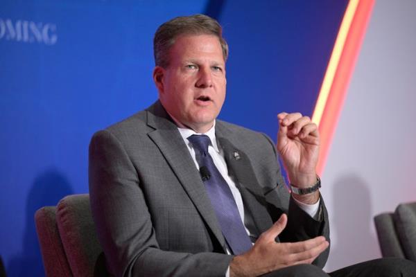 New Hampshire Gov. Chris Sununu takes part in a panel discussion during a 2022 Republican Governors Association co<em></em>nference in Orlando, Florida. Sununu, who said he won't seek reelection to a fifth term in 2024, said in an interview that the nation’s toxic political climate had no impact on his decision.