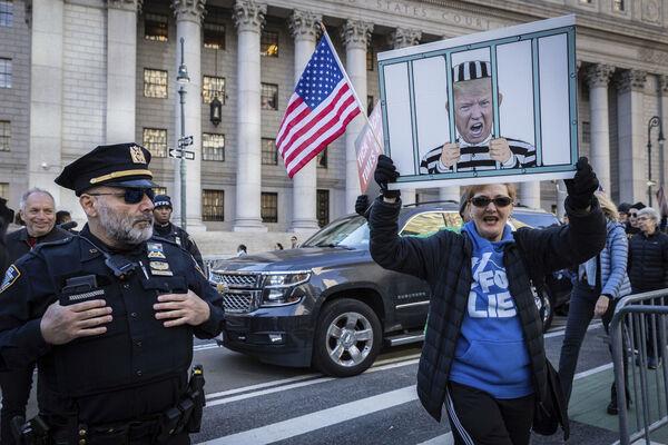 People protest against former President Do<em></em>nald Trump outside the New York Supreme Court, Monday, Nov. 6, 2023, in New York. Picture: AP Photo/Stefan Jeremiah