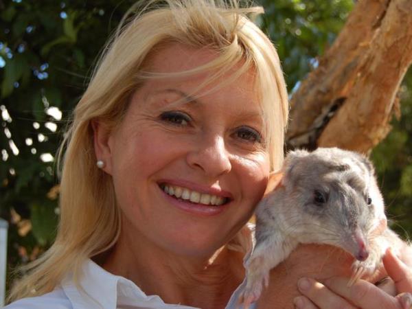 TV presenter Stacey Thomson aka Ranger Stacey posing with bilby animal in promotion for TV program <em></em>'Bilby Dreams<em></em>'.