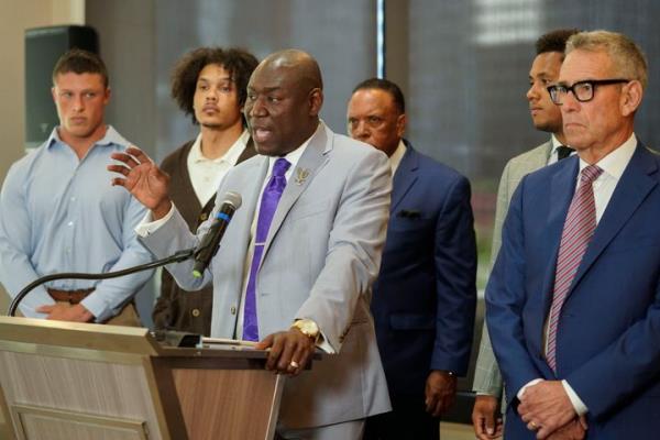 Standing with former Northwestern athletes, attorney Ben Crump speaks during a press co<em></em>nference addressing widespread hazing accusations at Northwestern University Wednesday, July 19, 2023, in Chicago.