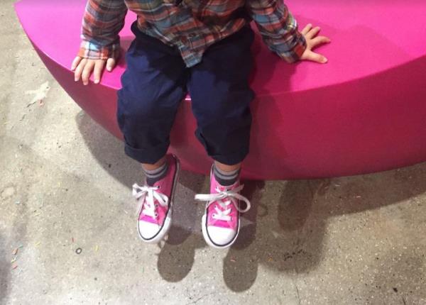 The author's son in his favorite pink Co<em></em>nverse shoes.