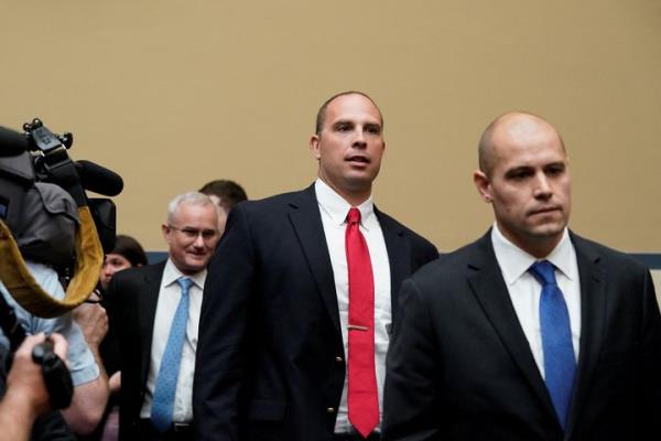 Ryan Graves, executive director of Americans for Safe Aerospace, David Grusch, former Natio<em></em>nal Reco<em></em>nnaissance Office representative on the Defense Department's Unidentified Aerial Phenomena Task Force, and retired Navy Commander David Fravor arrive for House Oversight & Accountability Committee's Natio<em></em>nal Security, the Border, and Foreign Affairs Subcommittee's hearing on 