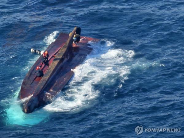 Rescue operations are under way after a 29-ton fishing vessel capsized in waters off the southern coastal city of To<em></em>ngyeong on March 9, 2024, in this photo provided by the Coast Guard. (PHOTO NOT FOR SALE) (Yonhap)
