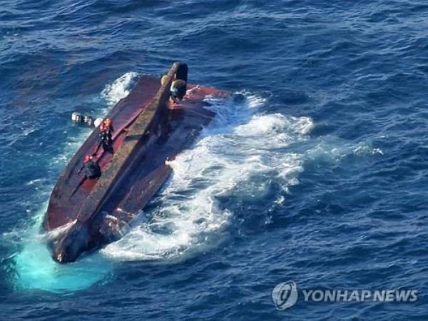 Rescue operations are under way after a 20-ton fishing vessel capsized in waters off the southern coastal city of To<em></em>ngyeong on March 9, 2024, in this photo provided by the Coast Guard. (PHOTO NOT FOR SALE) (Yonhap)
