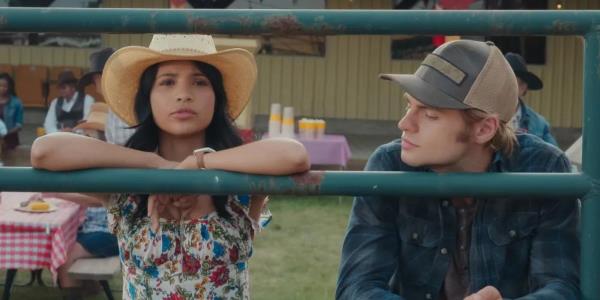Noah LaLo<em></em>nde as Cole Walter looking at Nikki Rodriguez's Jackie in My Life With the Walter Boys