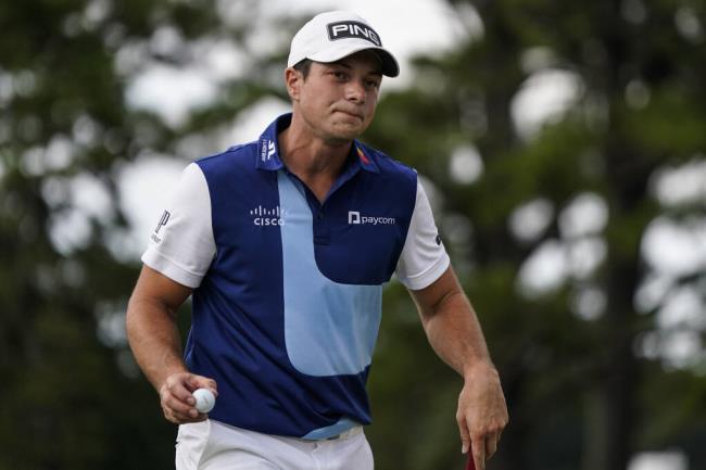 Viktor Hovland, of Norway, reacts after his putt on the fifth green during the third round of the Tour Champio<em></em>nship golf tournament, Sunday, Aug. 27, 2023, in Atlanta. (AP Photo/Mike Stewart)