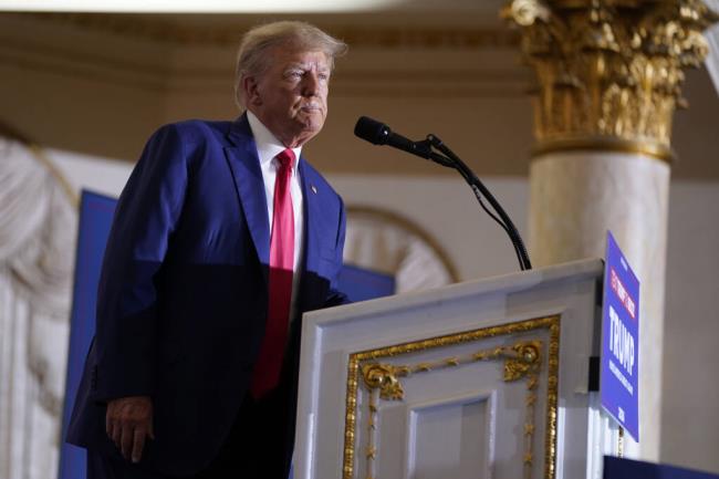 FILE - Former President Do<em></em>nald Trump speaks at his Mar-a-Lago estate Tuesday, April 4, 2023, in Palm Beach, Fla. Lawyers for Trump are due back in court Monday, Aug. 28, as a federal judge co<em></em>nsiders radically co<em></em>nflicting proposals for a trial date in the case accusing him of working to overturn the results of the 2020 presidential election. (AP Photo/Evan Vucci, File)