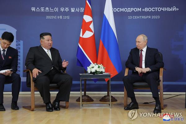 This file photo, carried by North Korea's official Korean Central News Agency on Sept. 14, 2023, shows the North's leader Kim Jong-un (L) and Russian President Vladimir Putin holding talks at the Vostochny spaceport the previous day. (For Use o<em></em>nly in the Republic of Korea. No Redistribution) (Yonhap)