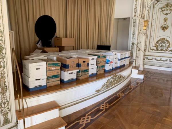 This image, co<em></em>ntained in the indictment against former President Do<em></em>nald Trump, shows boxes of records being stored on the stage in the White and Gold Ballroom at Trump's Mar-a-Lago estate in Palm Beach, Florida. 