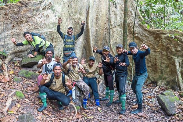 (From left) WWF Malaysia senior field biologist Afif Wafiy, senior anti-poaching patrol member Merapi Mat Razi, anti-poaching patrol team member Azib Adek, WWF Malaysia field biologist Imran Hamri, anti-poaching patrol team members Yahya Charol, Raihan Adoi, Zainal Abu, WWF Malaysia co<em></em>nservation assistant Syahrul Baharim and filmmaker and photographer Emmanuel Ro<em></em>ndeau after a big day working on installing high quality DSLR camera traps to try and capture an image of a tiger in Royal Belum State Park, Malaysia.