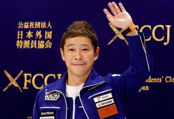 FILE PHOTO: Japanese billio<em></em>naire Yusaku Maezawa attends a news co<em></em>nference after returning to Japan after a journey into space, in Tokyo