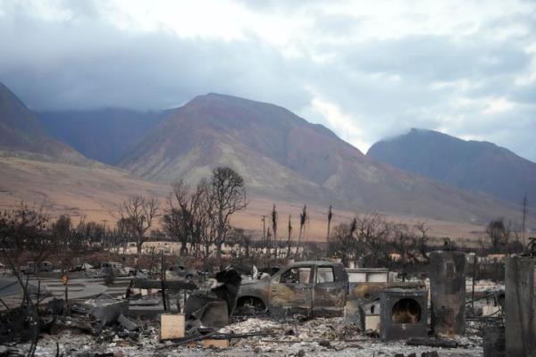 Wildfire wreckage is seen in Lahaina, Hawaii on Thursday. Graham, who was staying with a friend north of Lahaina, was a<em></em>bout to take a nap on Tuesday when she noticed the smell. She went outside, saw flames and smoke, and heard popping noises before fleeing with friends.
