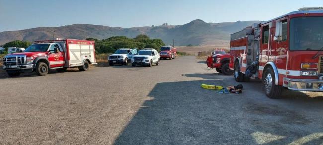 Emergency vehicles are parked at Duncans Point where crews rescued a person who drove into water, Wednesday, Aug. 30, 2023. (So<em></em>noma County Fire District)