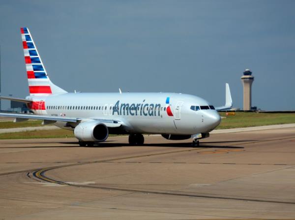 An American Airlines passenger plane is seen at the Dallas/Fort Worth Internatio<em></em>nal Airport. Tiffany Gomas called her co<em></em>nduct 