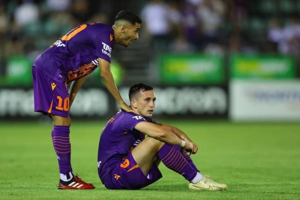 PERTH, AUSTRALIA - DECEMBER 23: Salim Khelifi and Aaron McEneff of the Glory look after the final whistle during the round nine A-League Men's match between Perth Glory and Wellington Phoenix at Macedo<em></em>nia Park, on December 23, 2022, in Perth, Australia. (Photo by Paul Kane/Getty Images)