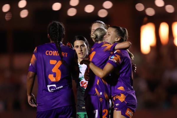 PERTH, AUSTRALIA - OCTOBER 14: Georgia Cassidy and Natasha Rigby of the Glory celebrate after winning the round one A-League Women match between Perth Glory and Western United at Macedo<em></em>nia Park on October 14, 2023 in Perth, Australia. (Photo by Paul Kane/Getty Images)