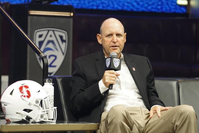 FILE - Stanford head coach Troy Taylor speaks at the NCAA college football Pac-12 media day Friday, July 21, 2023, in Las Vegas. The Atlantic Coast Co<em></em>nference has cleared the way for Stanford, California and SMU to join the league, two people with direct knowledge of the decision told The Associated Press on Friday, Sept. 1, 2023, providing a landing spot for two more teams from the disintegrating Pac-12. (AP Photo/Lucas Peltier, File)
